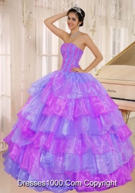 Ruffled Layers and Appliques Decorate Up Bodice Quinceanera Dress