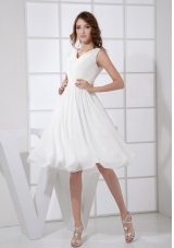 V-neck White 2013 Prom Dress Chiffon Empire,Do you want to experience the feeling of being the spotlight? This white prom dress will make your dream come ture! It features two wide straps bodice with a sexy V-neckline and lovely ruches throughout.The wasistband with gorgeous ruchings contours your curve. The pleated short skirt and the v shape and zipper up back adds the charm.A shining dress you can't miss!
