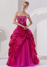 Hot Pink Taffeta Embroidery Strapless Quinceanera Dress,Unique and Charming! This gown is characterized by the structured bodice and the pick up skirt. The top bodice features which is full of embroidery features a strapless neckline. The skirt is a combination of taffeta and organza with outpayer adorned with pick ups, which creats a dramatic shape. This special dress is sure to impress at your special party! 

Silhouette: A-line
Neckline: Strapless
Waist: Natural
Hemline/Train: Floor-length
Sleeve Length: Sleeveless
Embellishment: Embroidery
Back Detail: Zipper-up 
Fully Lined: Yes
Built-In Bra: Yes
Fabric: Taffeta
Shown Color: Hot Pink(Color & Style representation may vary by monitor.)
Occasion: Prom, Quinceanera
Season: Spring, Summer, Fall