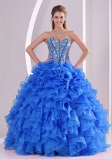 2014 Sweetheart Summer Royal Blue Quinceanera Gowns with Ruffles and Beading,Breathtaking in extreme, this strapless ball gown is sure to get you noticed! Richly beading abounds the fitted bodice with refined boning details and modest sweetheart. An oversize rosette blooms along the top of the densely ruffled skirt, which flares boldly to the floor. A lace up corset style closure in the back secures the dress in place. There's just something about vintage-inspired gowns that no other style can duplicate.
