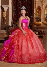 Ball Gown Strapless Ruffles and Beading Embroidery Red Designer Quinceanera Dress,The strapless sweetheart neckline is completely adorned with crystals. 
The bodice is accented with scattered beadwork.The full skirt creates a beautiful shape to complete the dress.If you're looking for a high-end dress without the high-end price tag, this is definitely one you should consider.
