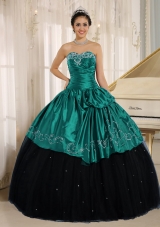 Custom Made Turquoise and Black Quincenera Dresses with Beading and Embroidery