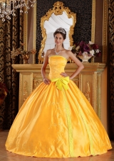 2014 Discount Golden Puffy Strapless Embroidery Quinceanera Dress with Bow