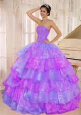 Ruffled Layers and Appliques Decorate Up Bodice Quinceanera Dress