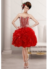 2015 Fashionable Sweetheart Prom with Beading and Ruffles,Silhouette: Short
Neckline: Sweetheart
Waist: Natural
Hemline/Train: Knee-length
Sleeve Length: Sleeveless
Embellishment: Beading,Ruffles
Back Detail: Lace 
Fully Lined: Yes
Built-In Bra: Yes
Fabric: Organza
Shown Color: Red(Color & Style representation may vary by monitor.)
Ocassion: Prom,Cocktail, Homecoming, Party
Season: Spring, Summer, Fall
This beautiful dress can be dressed for many ocassions, and it is worthy for your buying. 