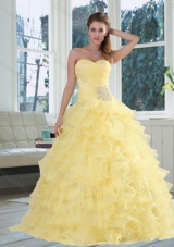 2015 Yellow Sweetheart Quinceanera Dress with Beading and Ruffled Layers