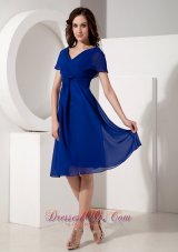 Short Sleeves Royal Blue V-neck Mother of the Bride Dress,A graceful and free-flowing look, this special occasion dress brings a romantic mood. Lightweight chiffon fabric creates delicate flutter sleeves at the bodice and cascades down the knee-length wrap-skirt in a playful ruffle. The wrap bodice has a tight ruche and a shapely v-neckline.With a zipper up back secure the dress in place and for well fit. 