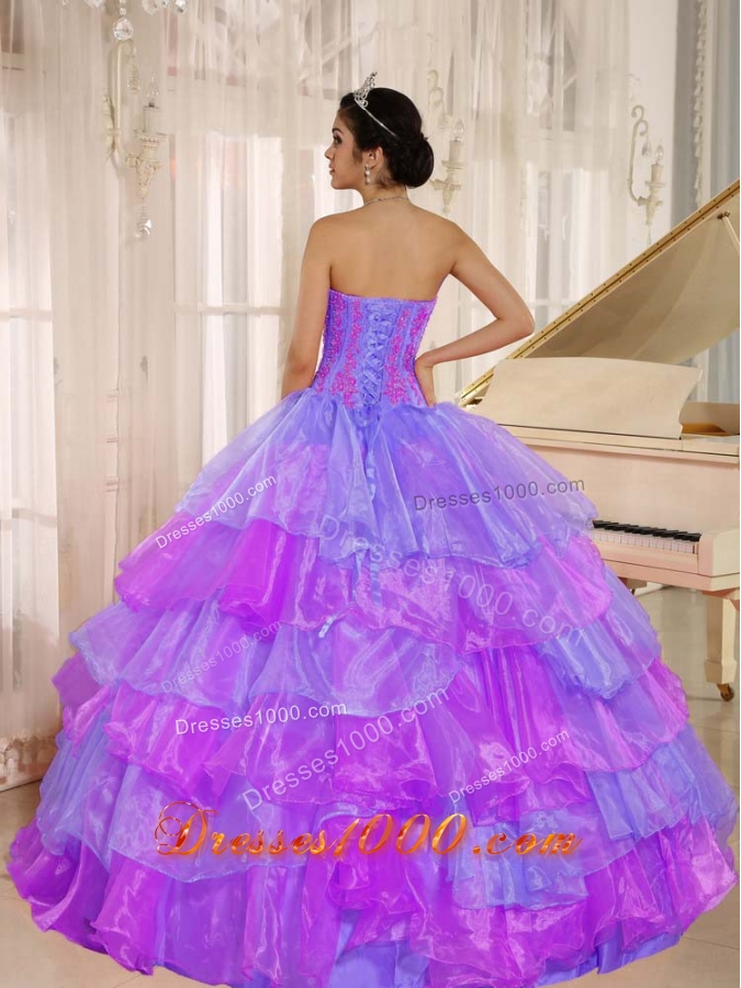 Ruffled Layers and Appliques Decorate Up Bodice Quinceanera Dress