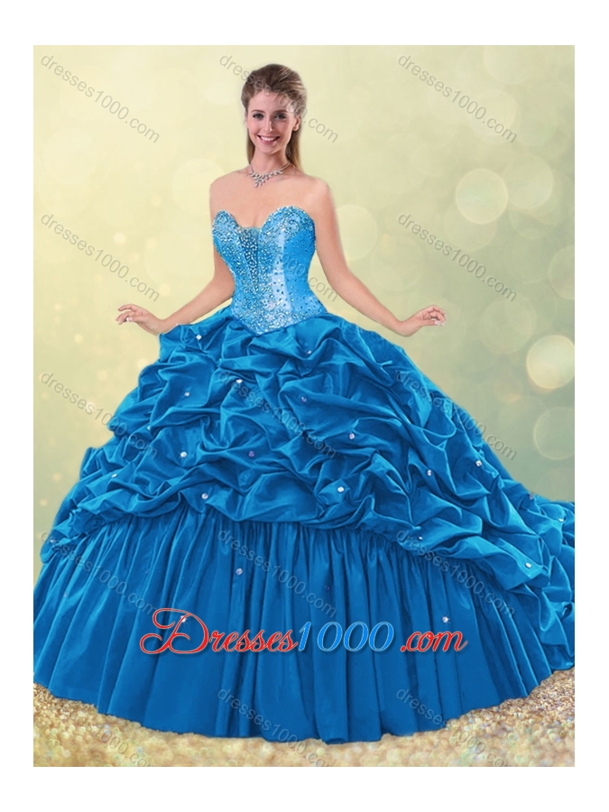 2016 Elegant Puffy Skirt Beaded Teal Quinceanera Dress with Brush Train