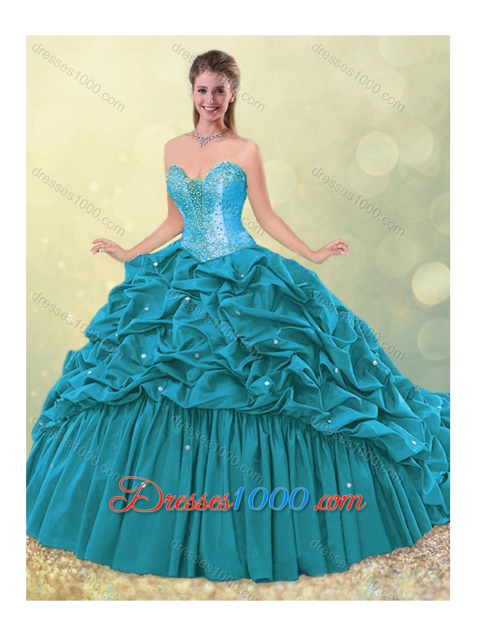 2016 Elegant Puffy Skirt Beaded Teal Quinceanera Dress with Brush Train