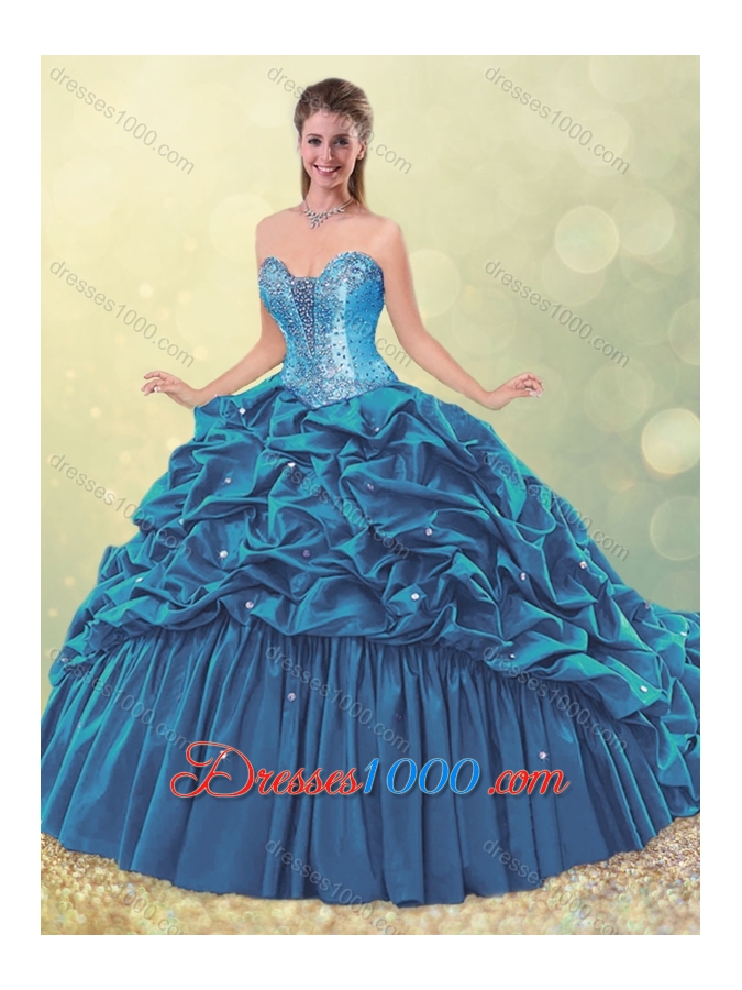 2016 Elegant Puffy Skirt Beaded Teal Quinceanera Dress with Brush Train