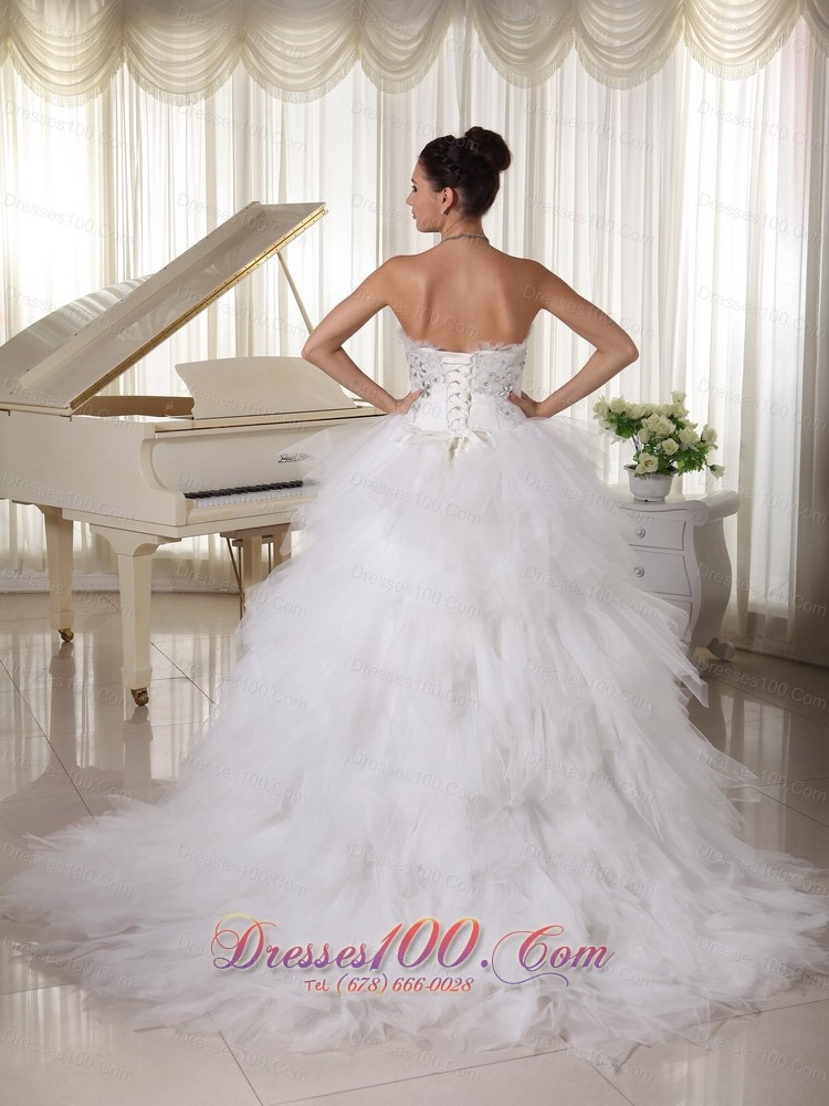 A-line Strapless Beaded Bridal Gown Tulle Ruffles Sweep Train